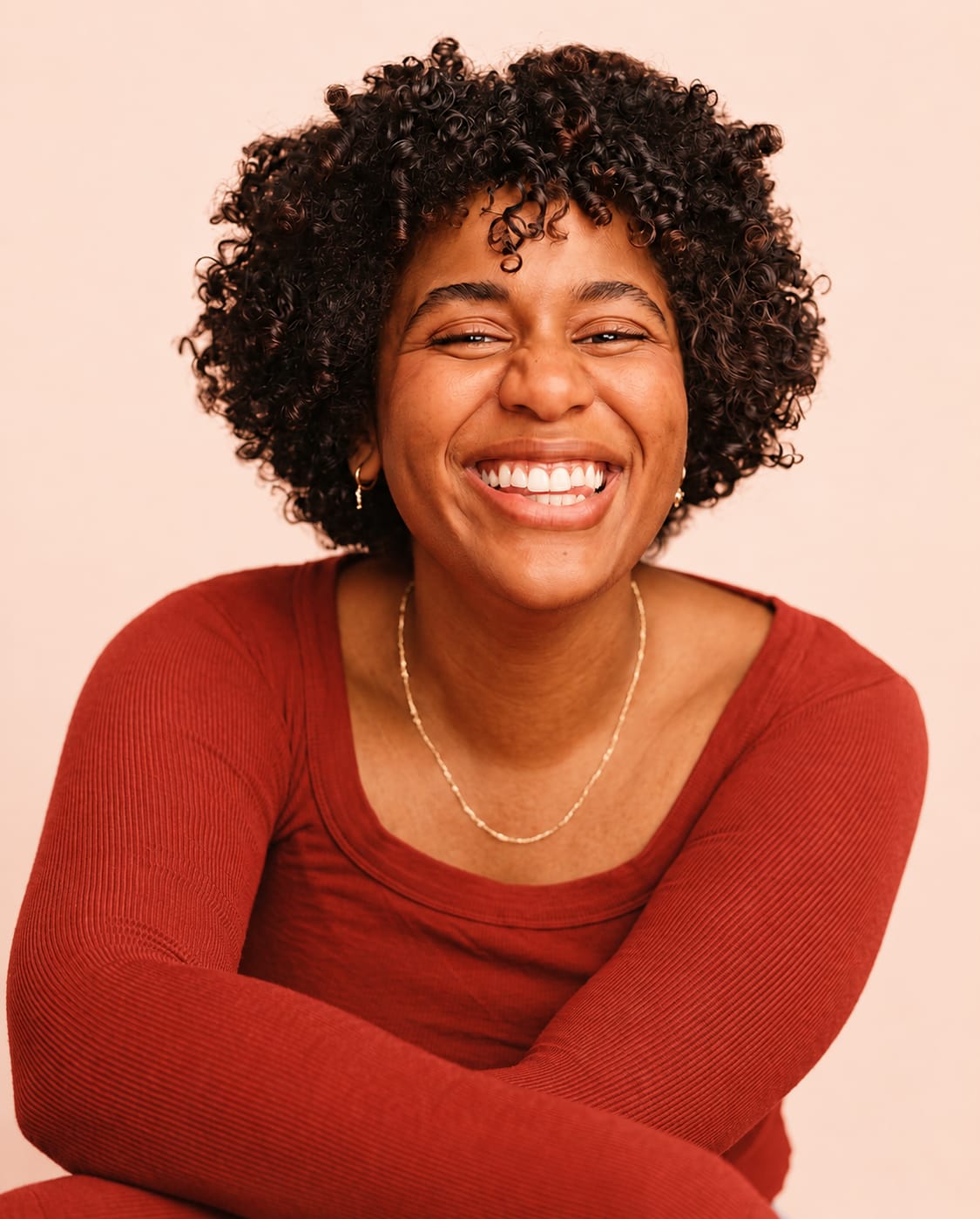 A woman smiling mid-conversation, the kind of moment we make sure no one is left outside of.